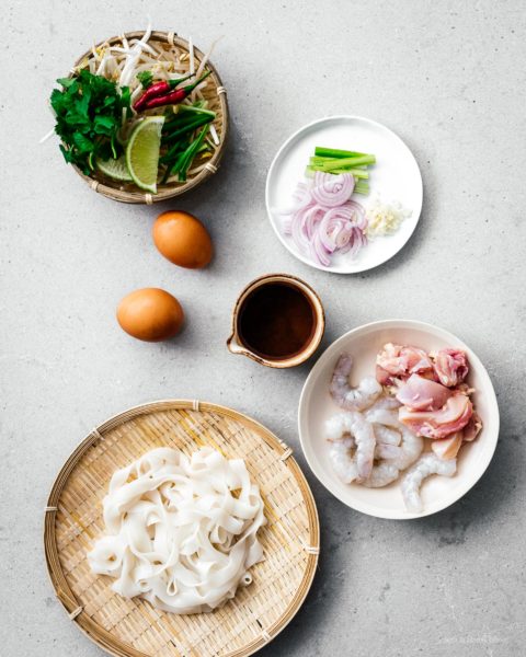 Make better than take out chicken and shrimp peanut free pad Thai right at home. Sweet, salty, savory – pad Thai is universally loved and for good reason. Forget delivery and customize your Pad Thai just the way you like it – this one had no peanuts because around here we do the #peanutfree life. Instead, there are buttery roasted cashews for that nutty crunch. #padthai #recipes #dinner #noodles #padthairecipe #thairecipes