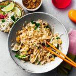 Make better than take out chicken and shrimp peanut free pad Thai right at home. Sweet, salty, savory – pad Thai is universally loved and for good reason. Forget delivery and customize your Pad Thai just the way you like it – this one had no peanuts because around here we do the #peanutfree life. Instead, there are buttery roasted cashews for that nutty crunch. #padthai #recipes #dinner #noodles #padthairecipe #thairecipes