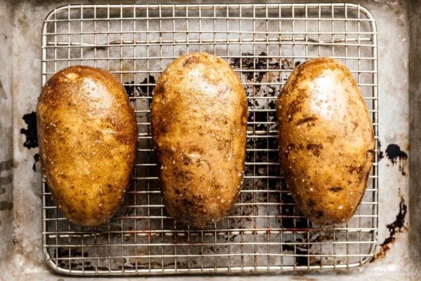potatoes on baking rack ready to bake | www.iamafoodblog.com